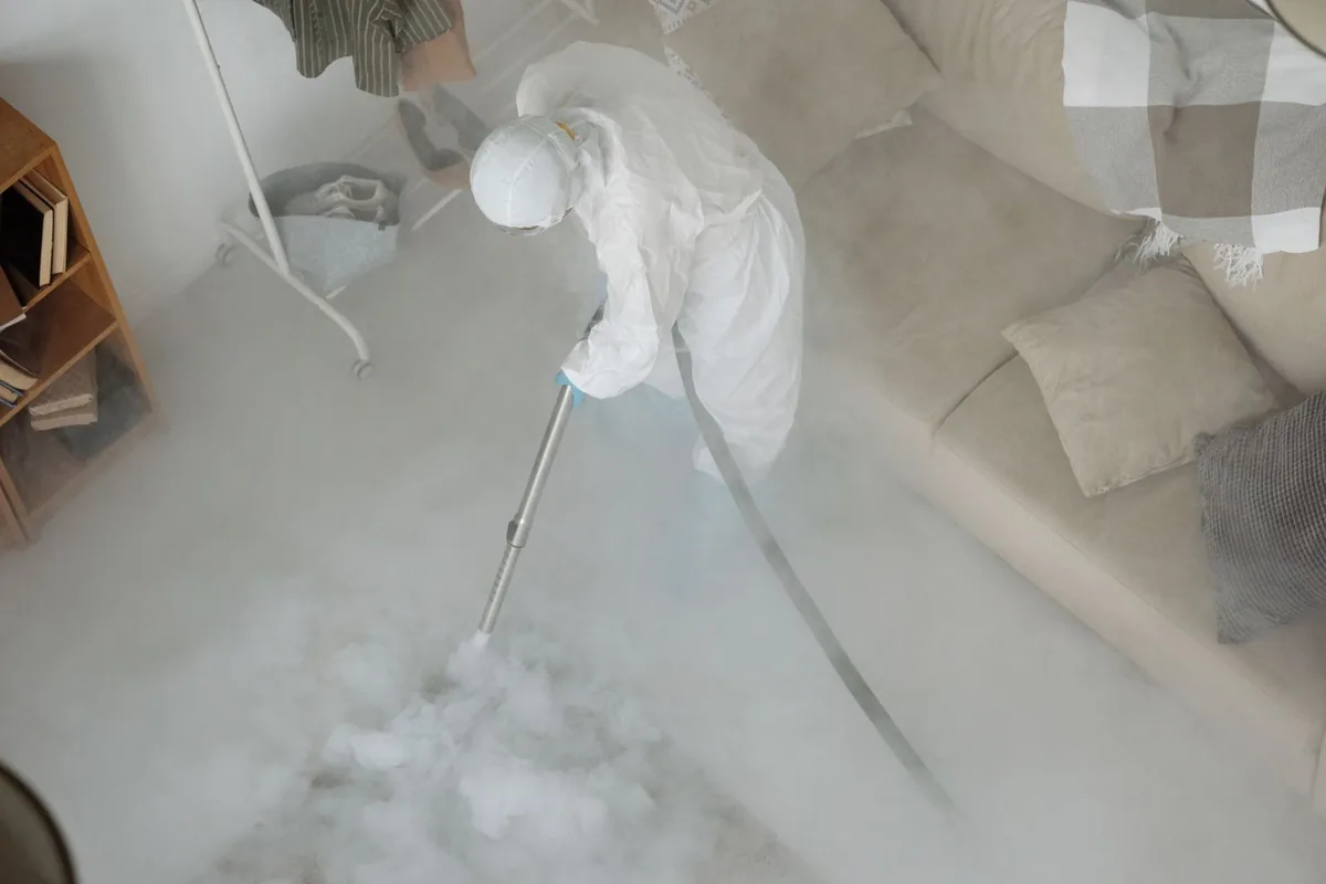 Biohazard cleanup technician in protective equipment, Helena Valley Southeast, MT